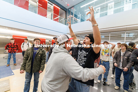 Carter Schrunk, junior, left, and Vinny Bui, sophomore, celebrate after their team is announced as t