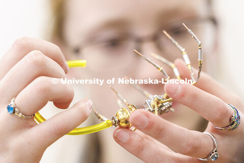Natalie Schmersal, sophomore, works on constructing an alchemist spider for the Johnny Carson Center