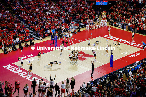 A composite photo showing Nebraska volleyball compete against Wisconsin during the NCAA Volleyball T