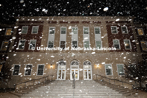 Snow falls onto the Nebraska Union, exterior south view. Snow on City Campus. January 4, 2025. 