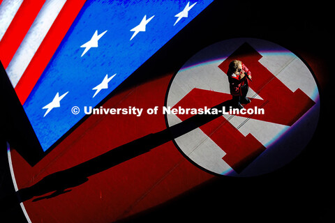 Amy Mincer performs the national anthem ahead of Nebraska’s wrestling match against Minnesota at t