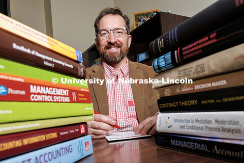 Todd Thornock, Associate Professor of Accountancy in the College of Business, poses for a portrait i