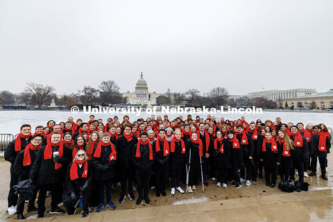 U.S. Congressman Mike Flood takes a group photo with the UNL Choir outside the United States Capitol