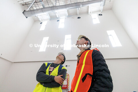 Austin Pick, left, and Jackson Myers, senior Architectural Studies majors, look up at the ceiling of