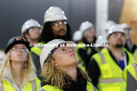 Lauren Christopher, senior Architectural Studies major, looks up at the ceiling during a tour of the