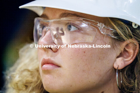 Lauren Christopher, senior Architectural Studies major, listens as Project Architect of Sinclair Hil