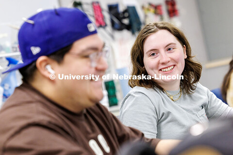 Aimee Wiebelhaus, right, talks with fellow senior Textiles, Merchandising and Fashion Design major S