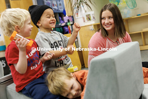 Lilly Jonas, sophomore Elementary Education and Early Child Education major, plays with children dur