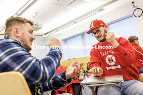 Blake Mace, left, and Brandon Roth, junior and senior Sports Media and Communications majors, play R