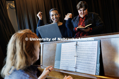 Sydney Kwasa, left, junior acting major, reacts after being encouraged to be creative with her solo 