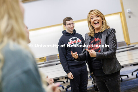 Julie Uribe, Lecturer in the College of Business, guides students through various warm-up activities