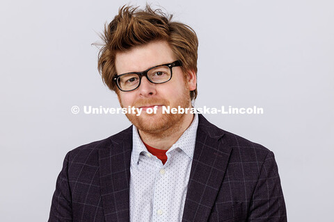 Studio portrait of Mark Adams, Assistant Professor of Instrumental Music Education in the Glenn Korf