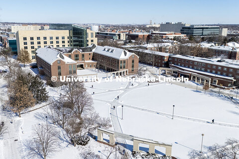 Students crossing campus in the snow. Aerial view looking Northeast, Kauffman Residential Center, Ha