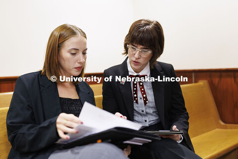 Lecturer Rachel Tomlinson Dick, right, talks with a law student in the Housing Justice Clinic. Colle