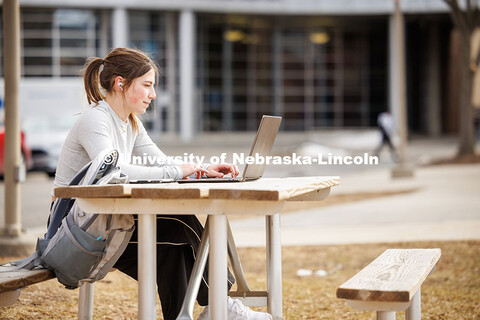 Grace Henry, a junior Biological Sciences major, works on homework in the green space on City Campus