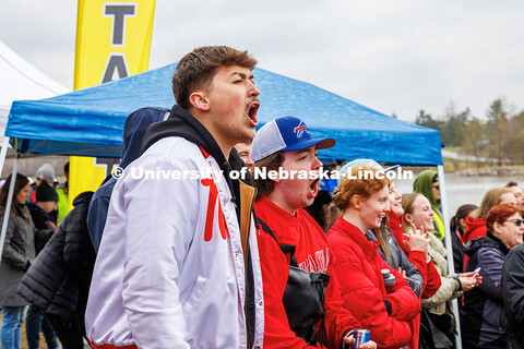 (Left to right) Jake Parkman and Alex Goff, both senior civil engineering majors cheer on their team