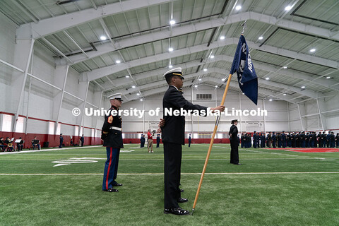 A cadet holds a flag at Chancellor Rodney D. Bennett's ROTC Review. Joint Service Chancellor’s Rev