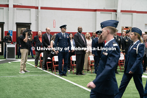 Chancellor Bennett watches on as ROTC students march to conclude the ceremony. Joint Service Chancel