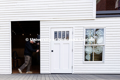 Ethan Watermeier, third year architecture student, pushes open an entrance to the Art Chapel. Art Ch