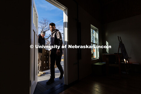 Third year architecture students Devyn Beekman, right, and Ethan Watermeier walk into the building. 