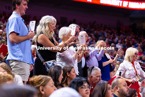 Family members cheer for Claire Hake as she enters Pinnacle Bank Arena during the University of Nebr