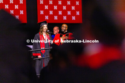 Annie von Kampen sings the National Anthem during the afternoon commencement ceremony at Pinnacle Ba
