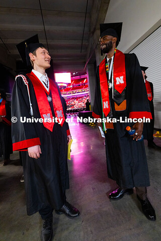 Computer Science graduates Matthew Donsig (l) and Abdelrahman Abdelazim Elhaj chat before the Univer