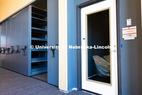 Construction crews add the final touches to the library in the new Hixson-Lied College of Fine and P