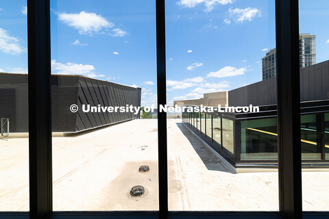 Large windows on the second floor of the new Hixson-Lied College of Fine and Performing Arts music b