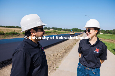 Nitish Bastola and Taisa Medina, PhD Civil Engineering students at UNL, beside Foundry Road in South