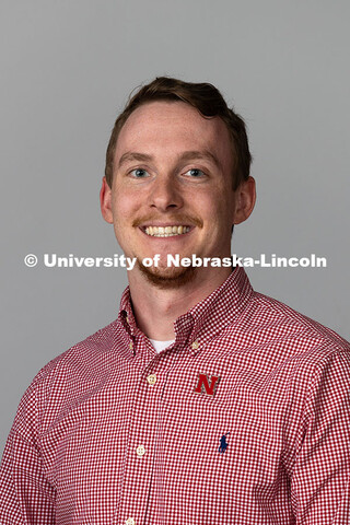 Studio portrait of Carson Schlautman, Academic Adviser for the Exploratory and Pre-Professional Advi