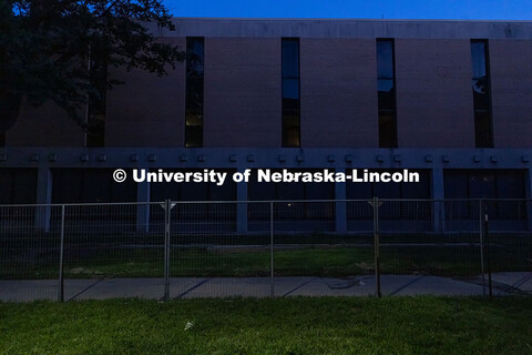 Fencing goes up around Westbrook Music Building prior to its demolition in the summer 2025. June 18,
