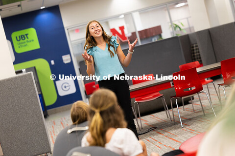 Megan Macklin, 16, practices her speech with her sisters and cousins before the Nebraska 4-H senior 