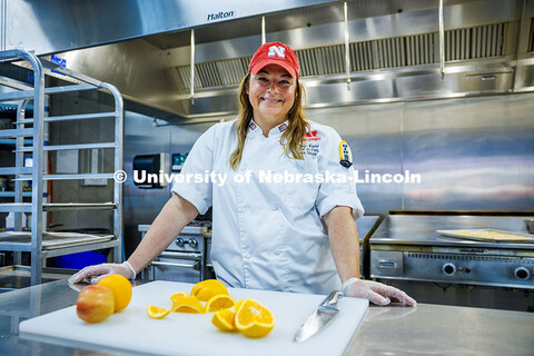 Paige Knebel poses in the Willa Cather Dining Hall. Knebel is the ‘Chef de Cuisine’ for UNL. Her