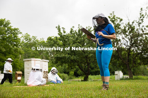 Courtney Brummel, Bee Lab Program Coordinator in the Department of Entomology, speaks to participant
