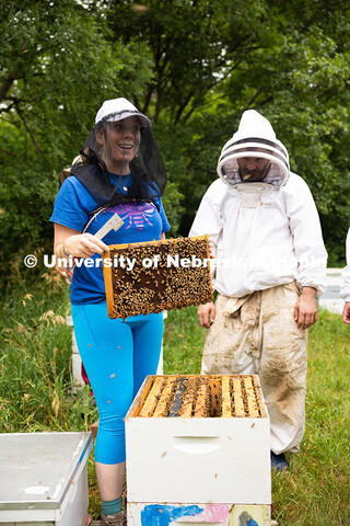Courtney Brummel, Bee Lab Program Coordinator in the Department of Entomology, speaks to participant