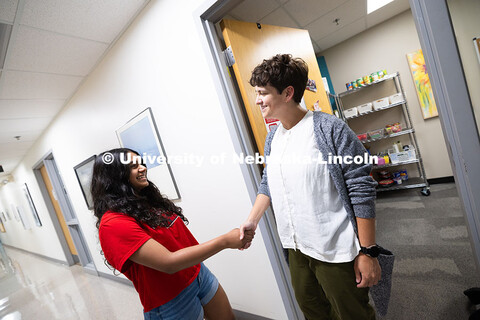 Sara Troupe shakes hands with Nyssa Fernandez, a sophomore studying Film, Emerging Media Arts and En