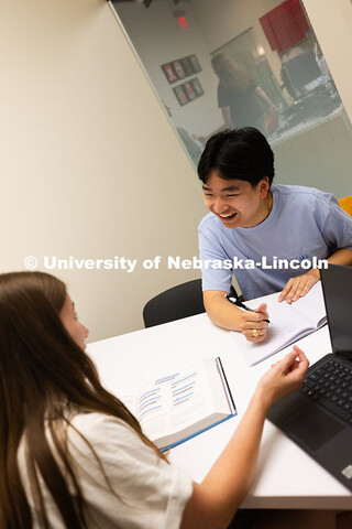 Students Kyanne Casperson and Jimmy Truong use the Study Stop in the Center for Academic Success and