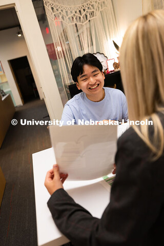 Jimmy Truong, a junior studying supply chain management, meets with Abigail Zagotta, academic succes