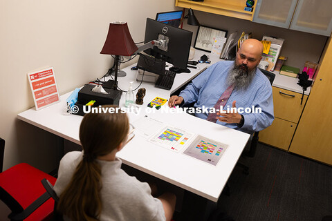Joel Cardenas, an academic success coach in the Center for Academic Success and Transition, meets wi