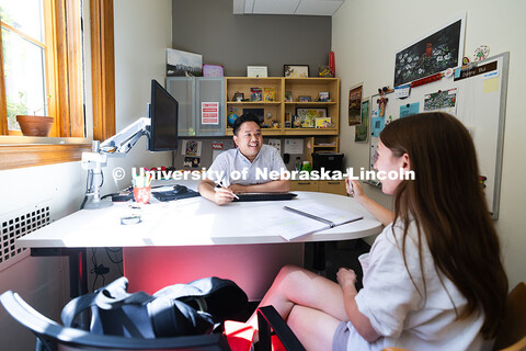 Donny Bui, an academic success coach in the Center for Academic Success and Transition, meets with K
