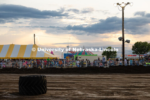 Tractors pulled graders around the Polk County Fairgrounds arena before finals for Figure 8 Racing T