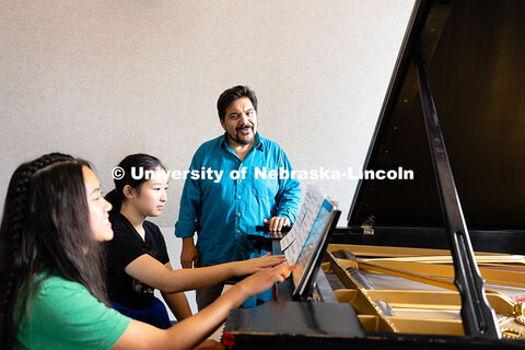 Marcelo Lian works with high school students on a piece by Frederic Chopin during the 2025 Lied Cent