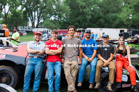 UNL Figure 8 Racing members pose before the Saline County Fair race in Crete, Nebraska. (Front, left