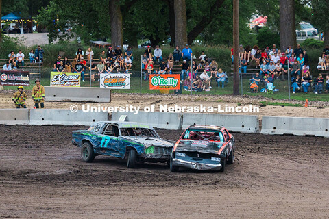 Anna Hadan and the number 12 UNL Figure 8 Racing car (right) gets nudged by another driver during th