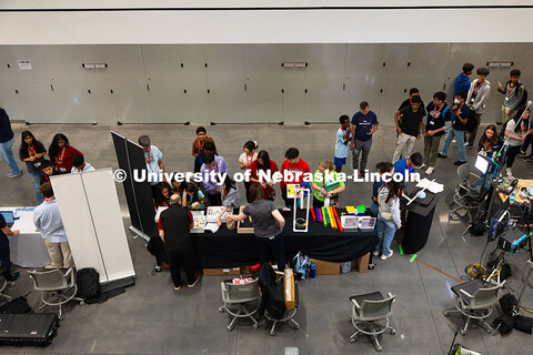 Students gather at the Ward's Science exhibit during the Science Olympiad National Tournament STEM E