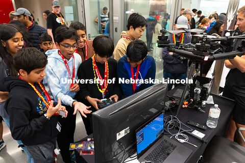 Students from BASIS Chandler, a public charter school in Arizona, take turns using a drone simulator