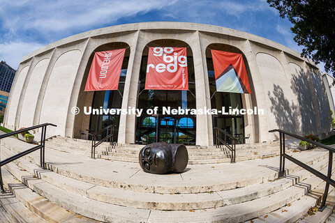 Signs hanging outside the Sheldon Memorial Art Gallery for the Go Big Red Exhibition. Summer on City