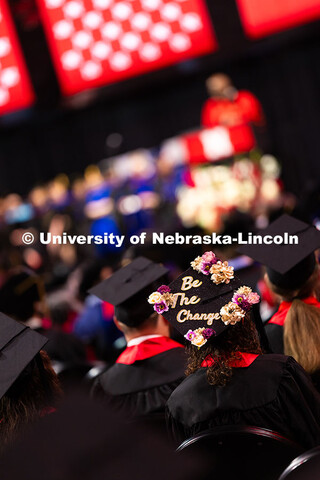 Sierra Klein's cap reads "Be the change," and is decorated with pink and white flowers. Summer Comme