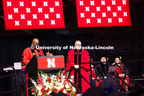 Chancellor Rodney Bannett smiles while introducing Mike Zeleny, Vice Chancellor of Business and Fina